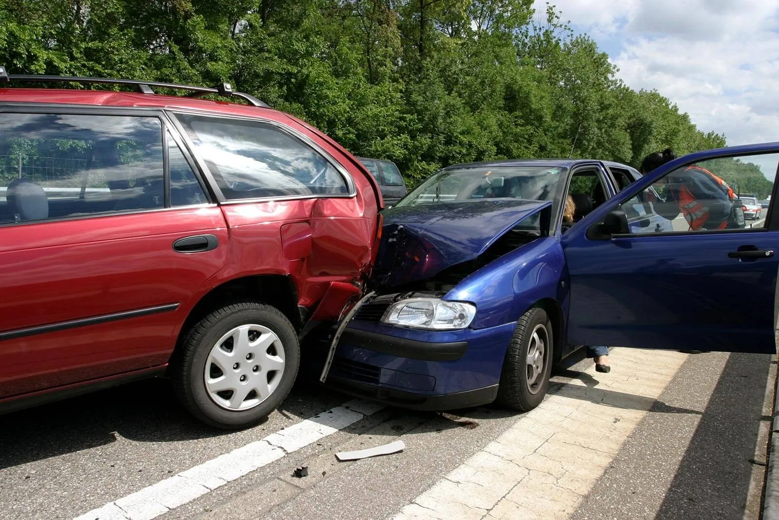 Two cars after a rear-end collision on a road